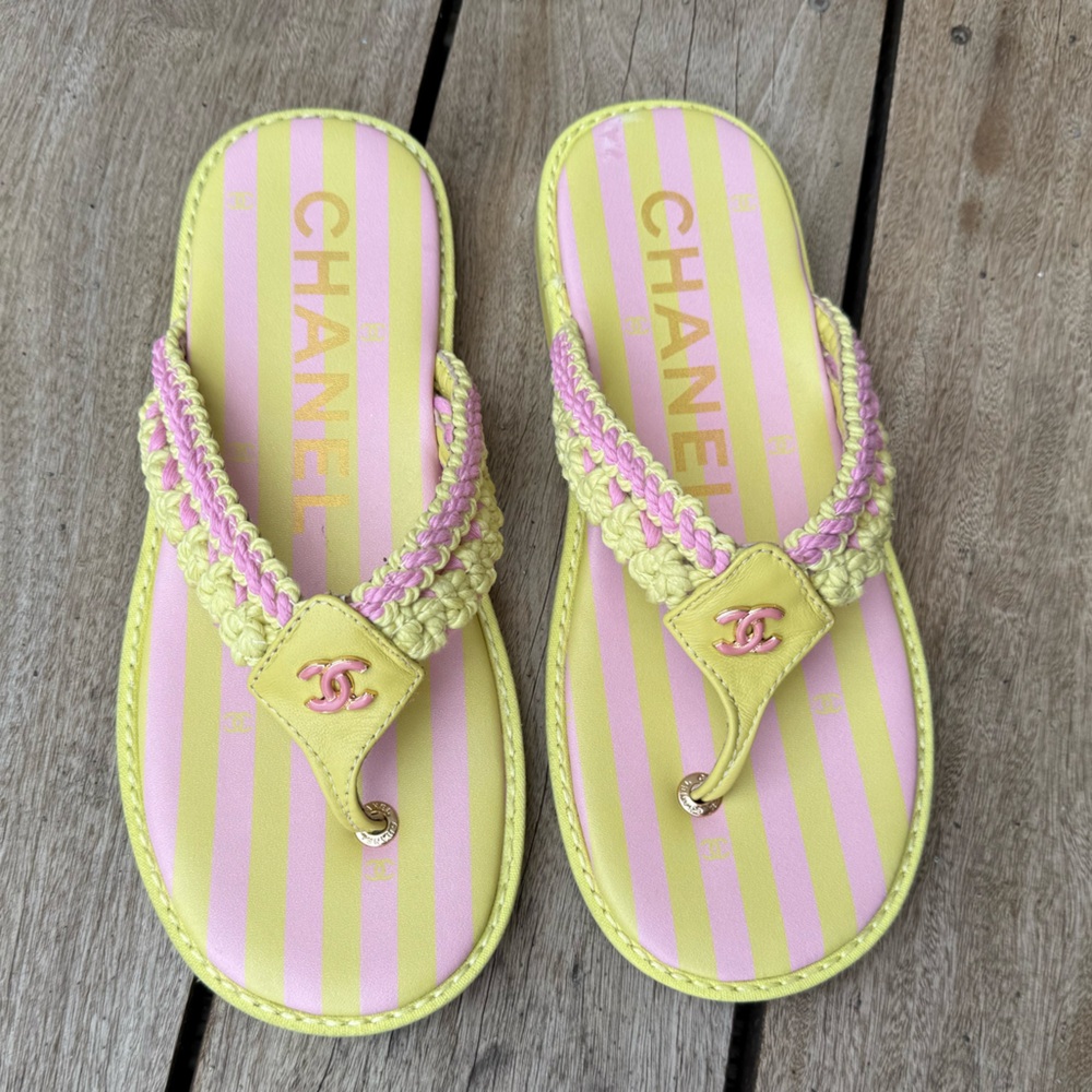 Pink and green flip flops